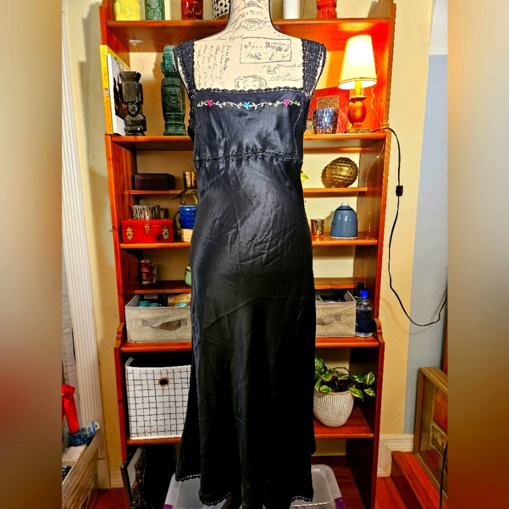 Bebe womans size Med black silk dress with lace detailing